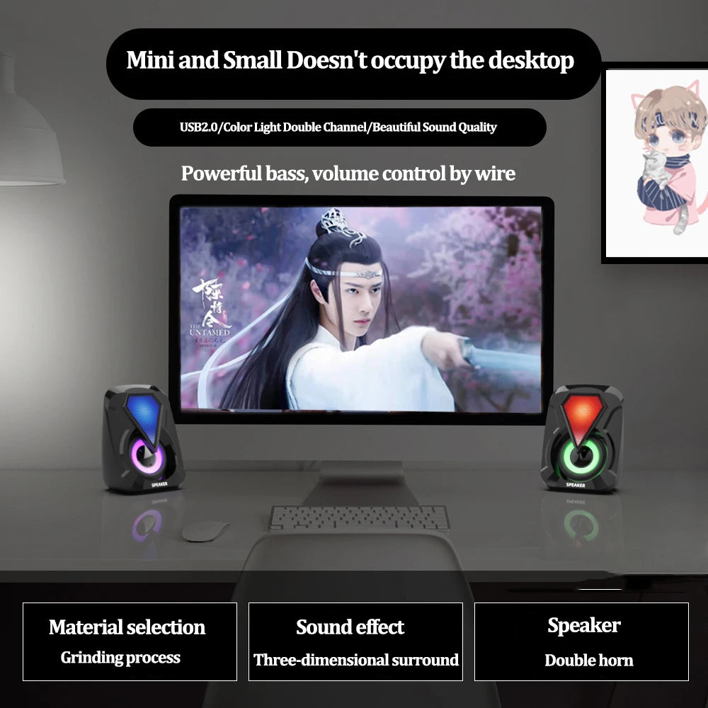 Computer setup with vibrant color speakers and a screen displaying a fantasy scene. Text highlights the compact design, USB 2.0, powerful bass, and three-dimensional surround sound.