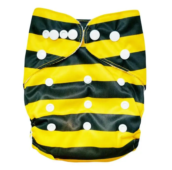 Cloth diaper with yellow and black stripes resembling a bee pattern, adorned with adjustable white snaps.