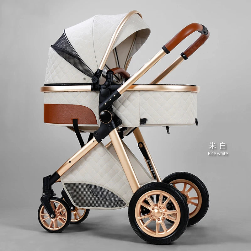 Elegant rice white baby stroller with quilted fabric, contrasting brown accents, and a gold frame, featuring a sun canopy, mesh sides, and four sturdy wheels.