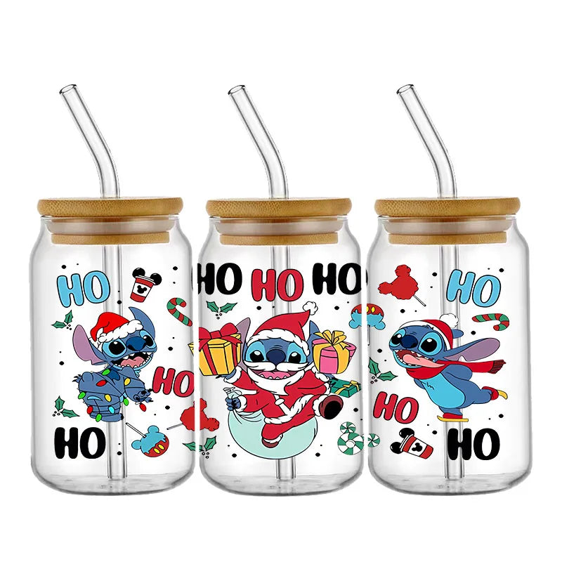 Three glass jars with bamboo lids and straws, featuring a cartoon character in Christmas outfits. The design includes festive elements like gifts, candy canes, and "Ho Ho Ho" text.