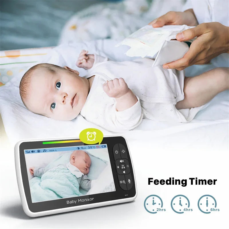 Baby lying on a blanket next to a baby monitor displaying the child sleeping. An adult's hands adjust a diaper. Text reads "Feeding Timer" with icons for 2, 4, and 6 hours.