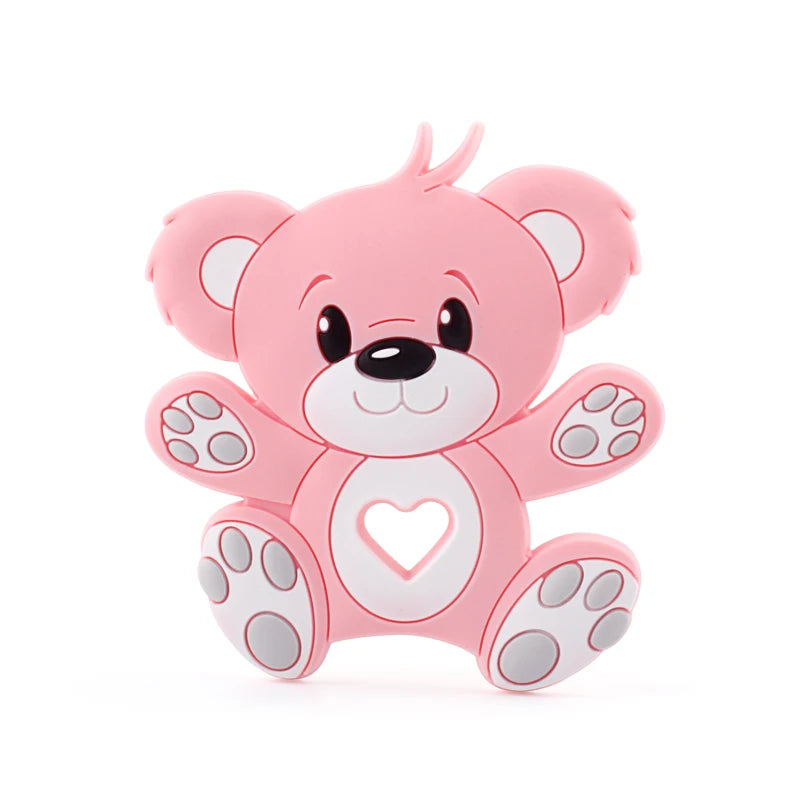 A cute pink teddy bear cartoon with large eyes, a white belly featuring a heart shape, and gray paw pads. The bear appears to be smiling with arms outstretched.