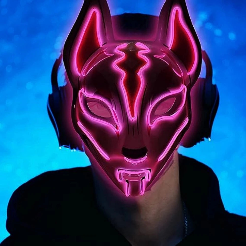 Person wearing a futuristic, glowing pink fox mask with headphones against a blue background.