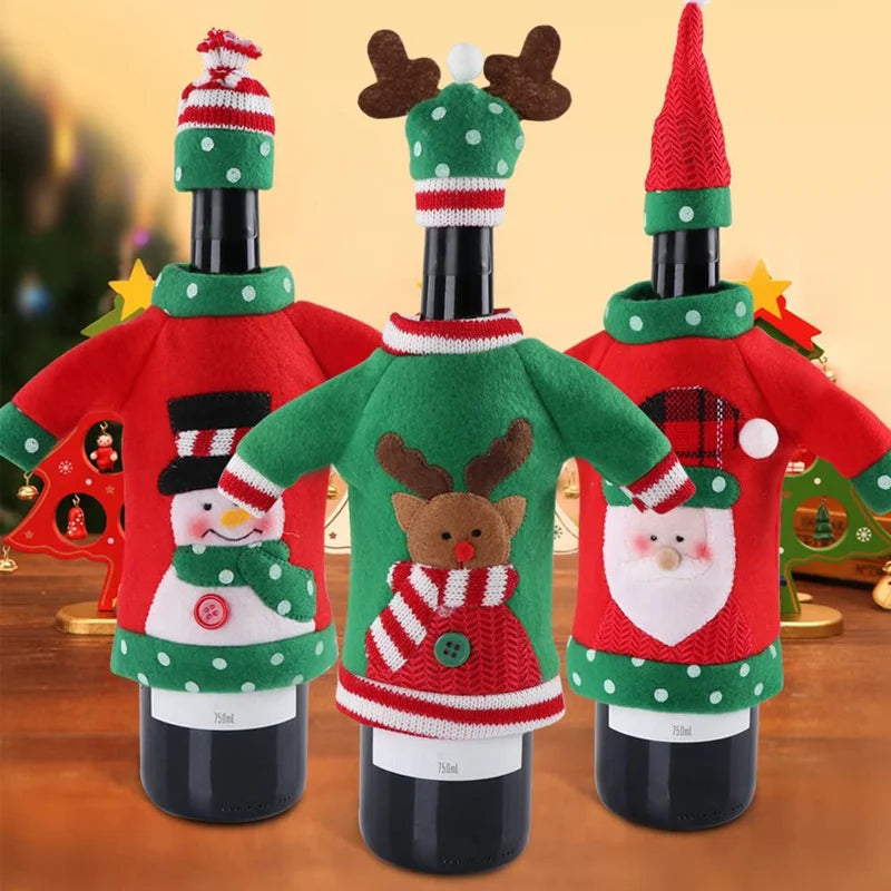Three wine bottles dressed in festive holiday sweaters and hats, featuring designs of a snowman, reindeer, and Santa, set against a warm, seasonal background.