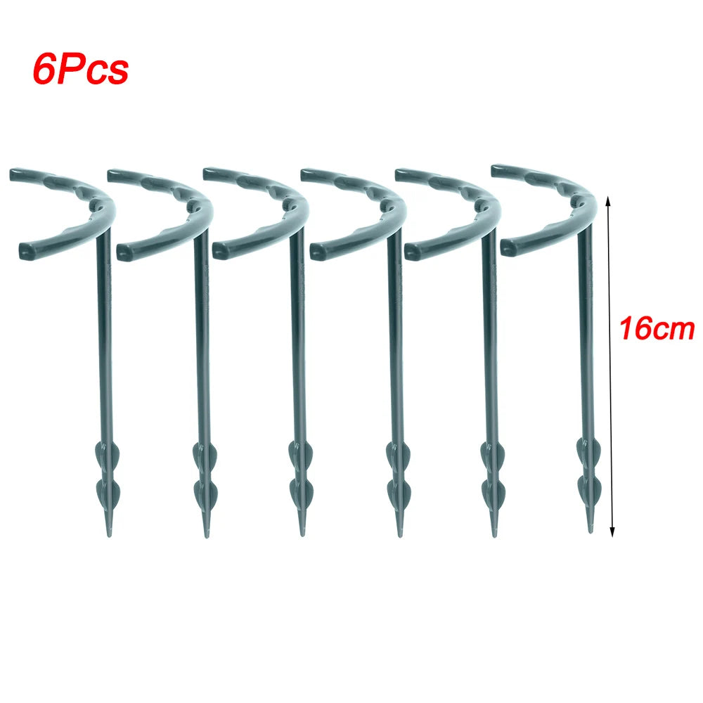Six black curved garden pegs, each 16cm long, shown in a row. The text "6 Pcs" is in the top left corner in red.