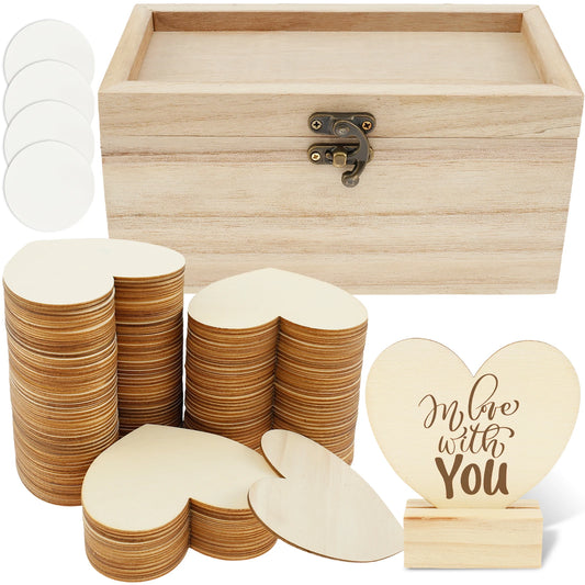 Wooden box with latch, four circular tabs, and stacked heart-shaped pieces. A standing heart reads "In love with you" on a wooden base.