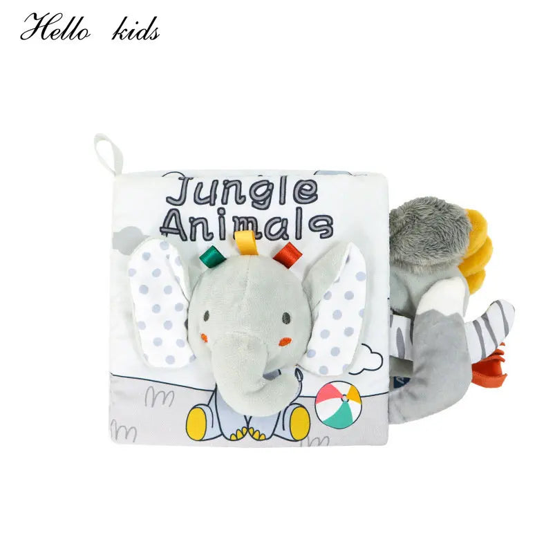 Soft fabric baby book titled "Jungle Animals" with an elephant face, colorful ribbon tabs, and playful polka dot ears. Other plush animals peek from the side.