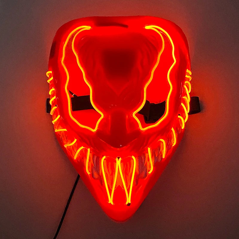 Red neon mask featuring menacing eyes and sharp, glowing teeth, designed for a haunting look. The mask emits a bright, eerie light, perfect for a horror-themed event.