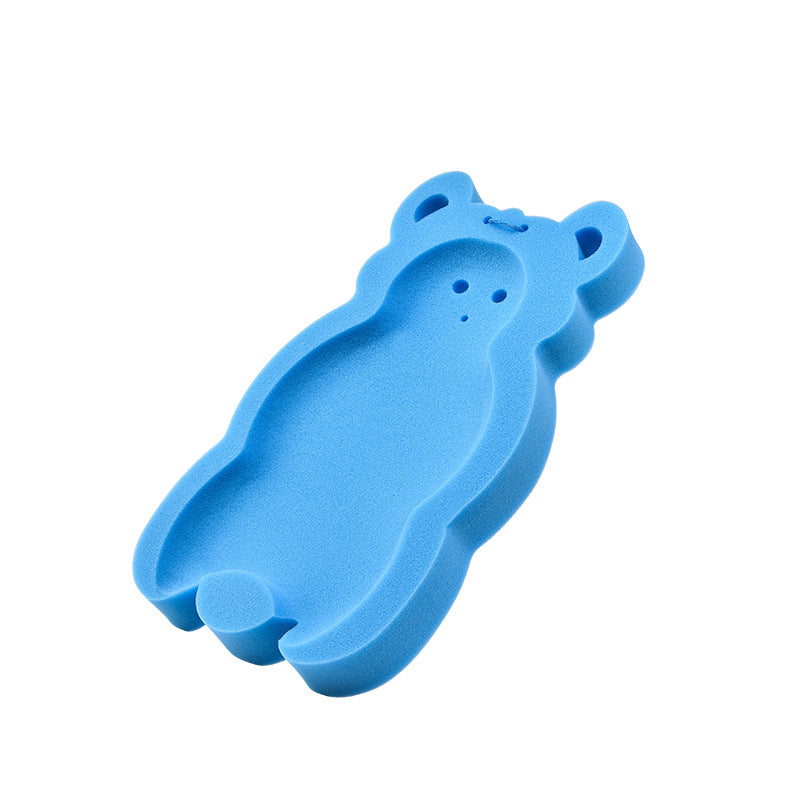 Blue bear-shaped foam sponge with ear and tail details, featuring a textured surface and two small holes for eyes.