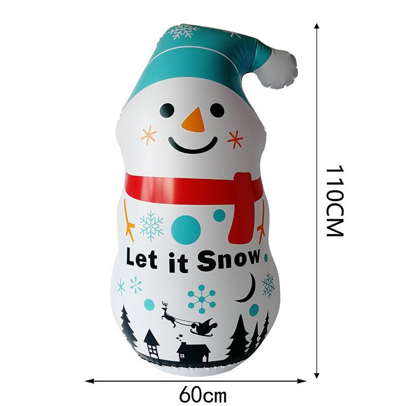 Inflatable snowman decoration, 110cm tall and 60cm wide, with a teal hat, red scarf, and smiling face. Features snowflakes, a winter scene, and the text "Let it Snow."