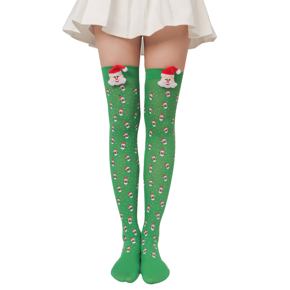 Woman wearing festive green knee-high socks with Santa Claus designs and a white skirt.
