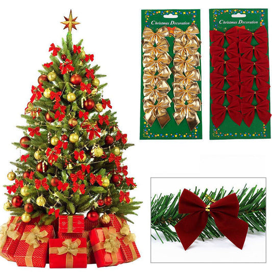 Festive Christmas tree adorned with red and gold ornaments and bows. Gift boxes wrapped in red and gold sit beneath. Packages of red and gold bows displayed on the right.