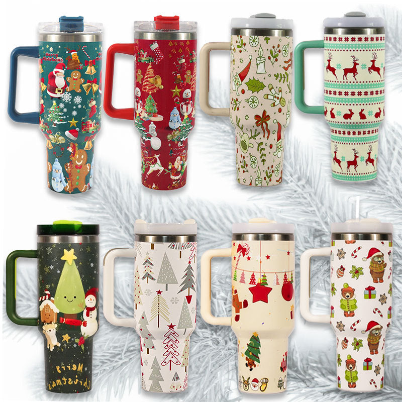 Eight festive travel mugs displayed in two rows, featuring various Christmas-themed designs like Santa, reindeer, ornaments, and gingerbread, set against a snowy background.