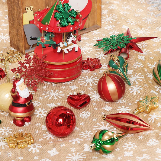 Festive Christmas scene with a red carousel, Santa figurine, red and gold ornaments, and snowflake patterns on a burlap surface, creating a warm holiday atmosphere.
