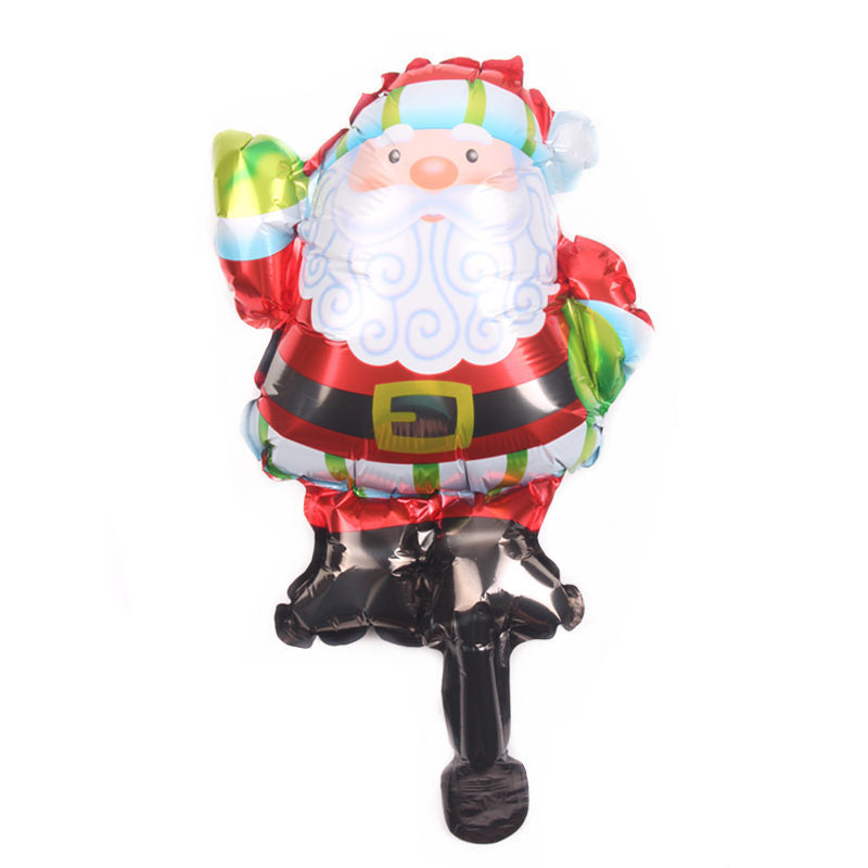 A colorful Santa Claus foil balloon featuring a red suit, white beard, and black boots. He appears jolly and is waving, with green and red holiday accents.