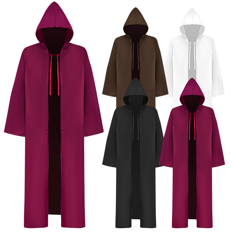 Five hooded cloaks in different colors: pink, black, brown, and white. Each cloak has an attached hood and a drawstring around the neck for closure.