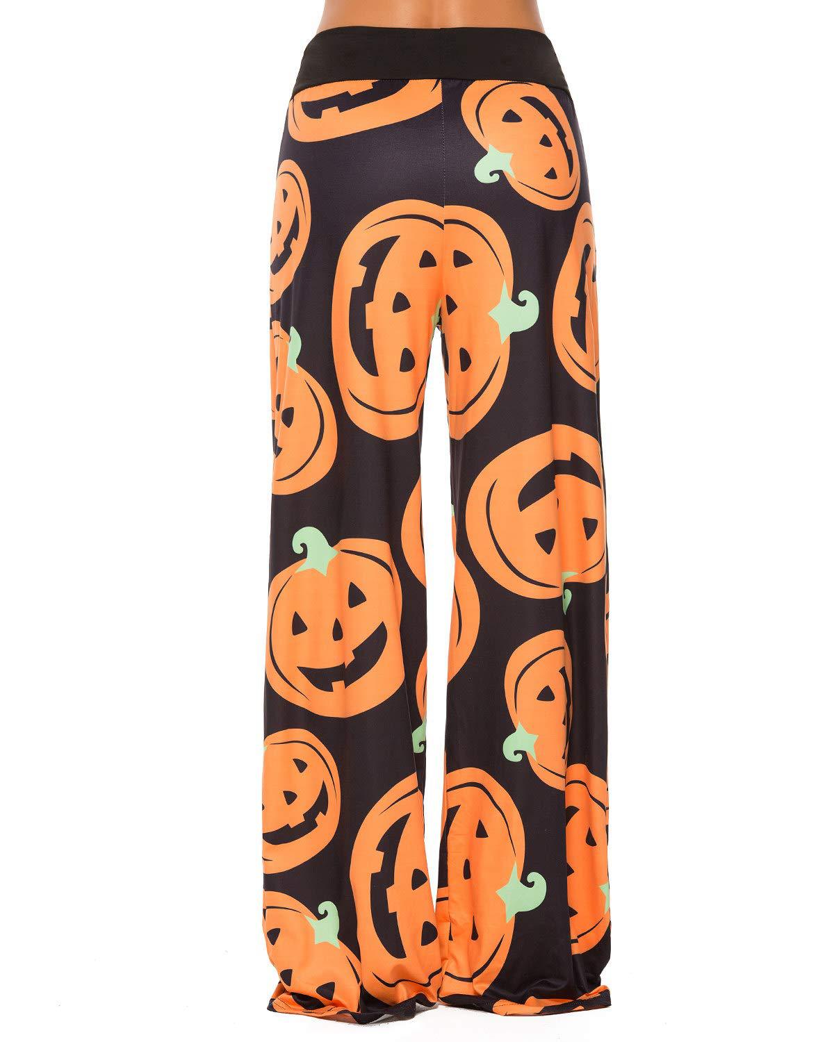 Black pants featuring a vibrant orange jack-o'-lantern pattern. The wide-leg design accentuates the Halloween theme with whimsical green stems on each pumpkin.