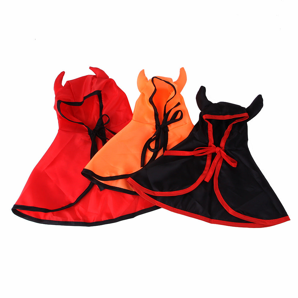 Three pet capes with devil horns in red, orange, and black. Each has black or red trim and ties. Perfect for Halloween or playful dress-up for small animals.