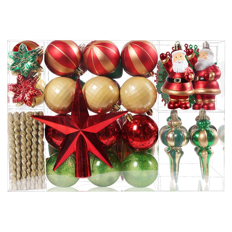 A boxed set of Christmas ornaments includes red and gold balls, Santa figures, a large red star, gold twisted ropes, green and red snowflakes, and vintage-style baubles.