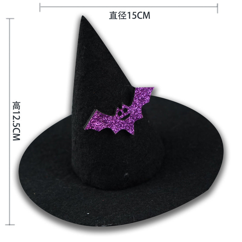 Black witch hat with purple glitter bat decoration. Hat is 12.5cm tall, brim has a 15cm diameter.