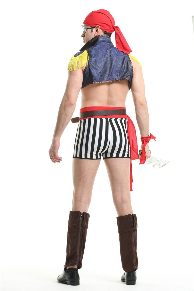 Back view of a man in a pirate costume with a red bandana, sleeveless blue vest, striped shorts, and brown boots, holding a faux sword.