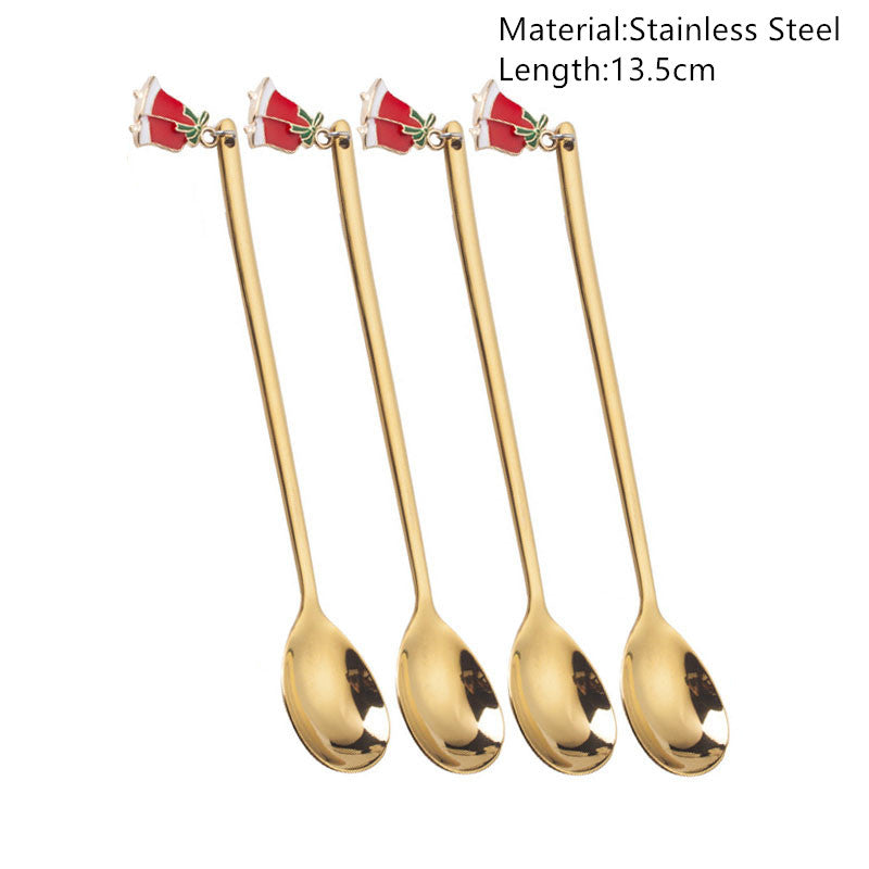 Four gold stainless steel spoons, each 13.5cm long, with red and white rose decorations on the handles.