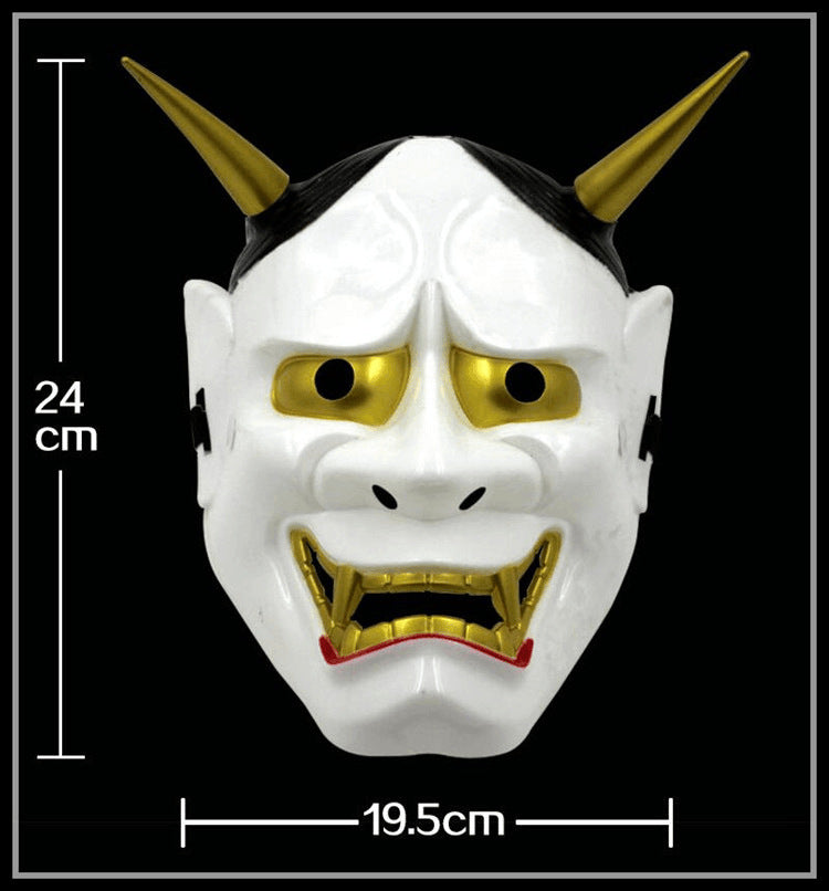 White mask with gold eyes and horns, and a fierce expression. Dimensions are 24 cm height and 19.5 cm width. Black background with measurement lines beside the mask.