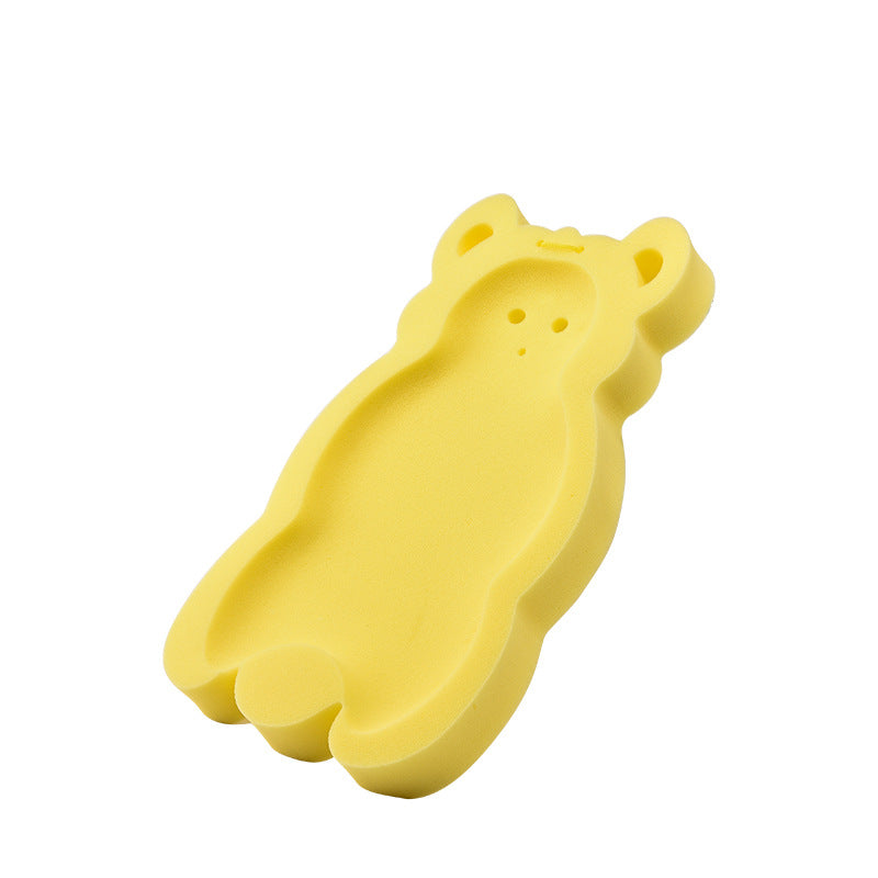 Yellow bear-shaped sponge with rounded edges and simple cut-out features, resting against a white background.