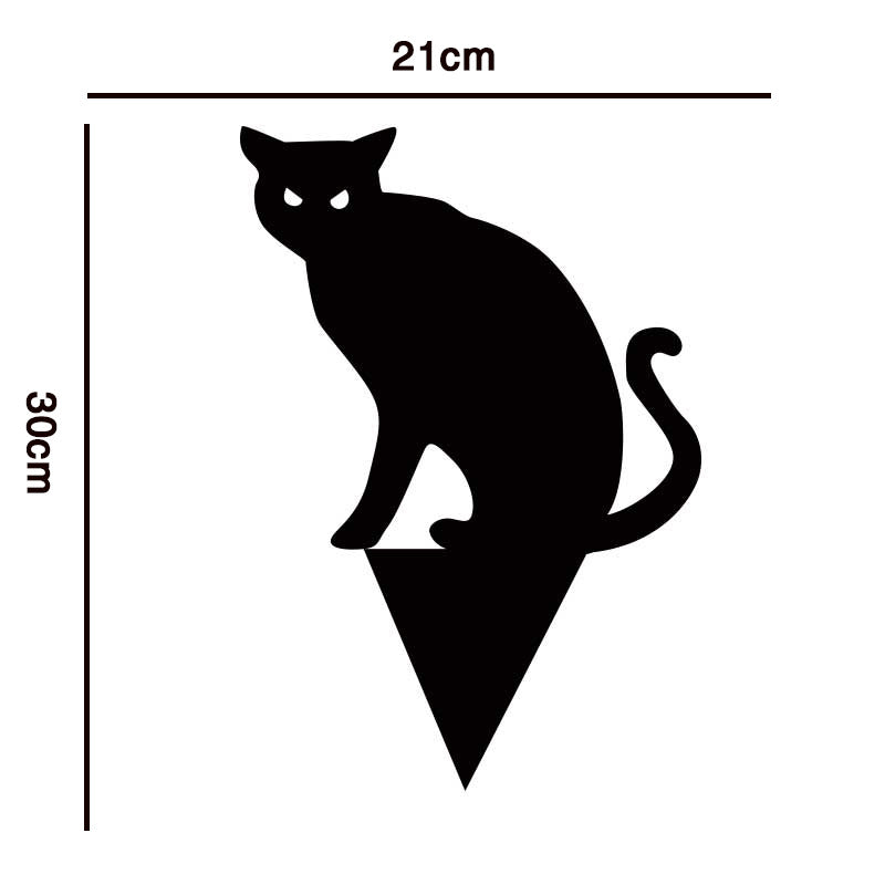 Silhouette of a sitting cat with pointed tail, eyes glowing, dimensions 21cm wide by 30cm tall, arrow-shaped base.