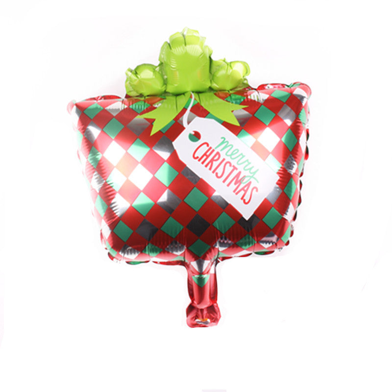 Square foil balloon with red, green, and silver checkered pattern, topped with a green bow. A tag reads "Merry Christmas" in red.