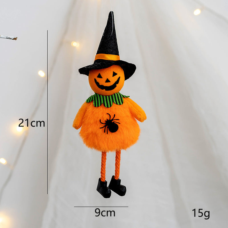 Orange Halloween decoration with a jack-o'-lantern face, black witch hat, green collar, and spider detail. Measures 21cm tall, 9cm wide, and weighs 15g.