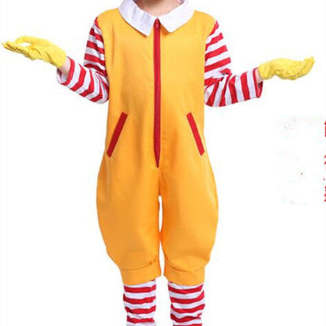 Child in a yellow jumpsuit with red-striped sleeves and legs, wearing yellow gloves. The outfit features a white collar and red vertical pocket accents. Arms are outstretched.