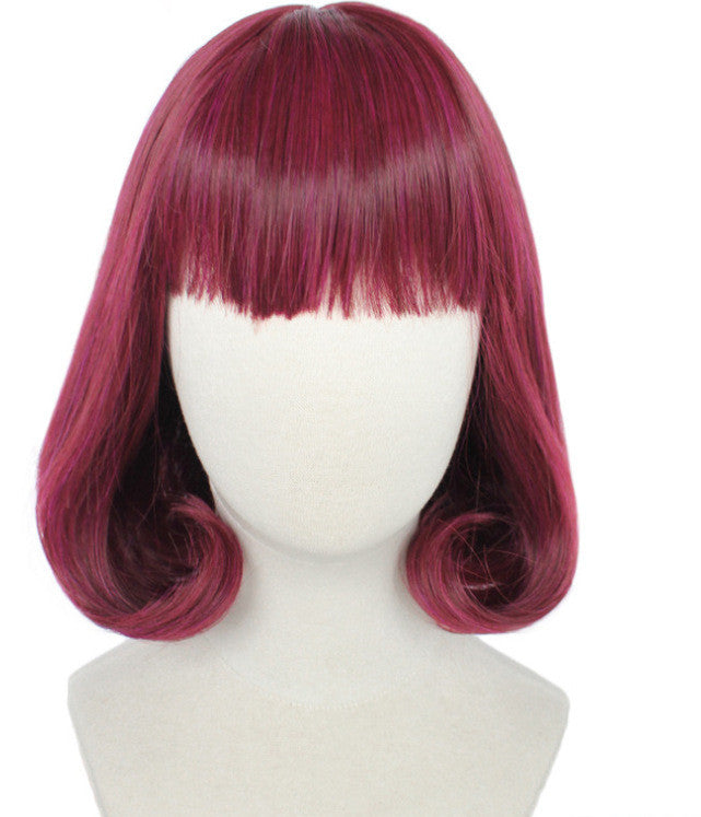 Mannequin head wearing a burgundy wig with short, curled ends and straight bangs, styled in a vintage bob.