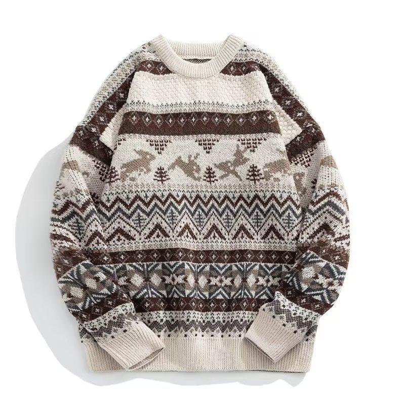 Cozy beige and brown sweater with reindeer and geometric patterns, featuring snowflakes and zigzag designs. The long sleeves and crew neck add to its warm, festive look.