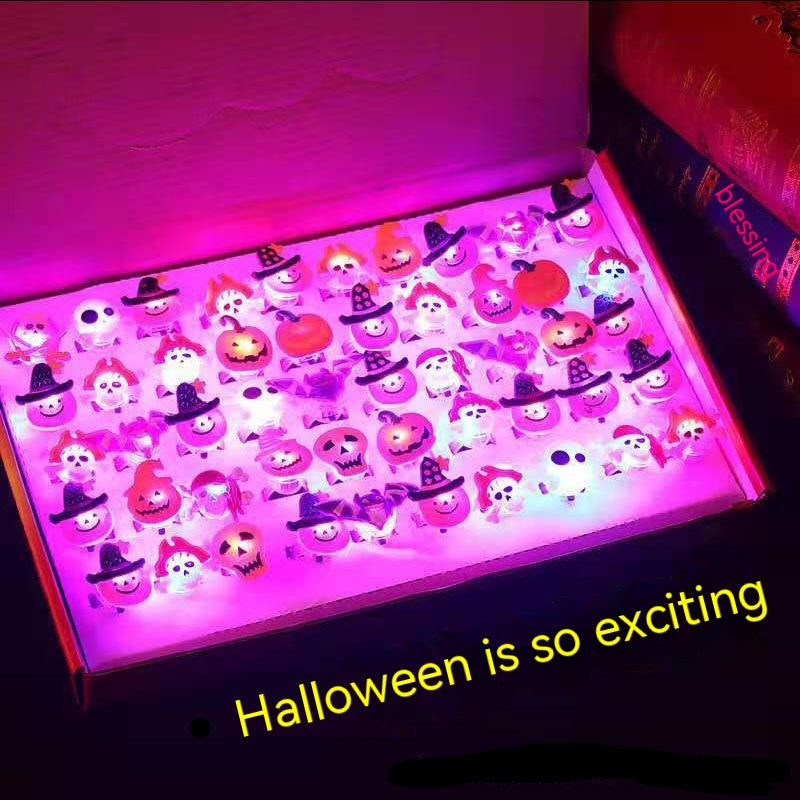 A box of glowing Halloween LED lights featuring pumpkins, ghosts, and witch hats, illuminated in purple. A yellow caption reads, "Halloween is so exciting."