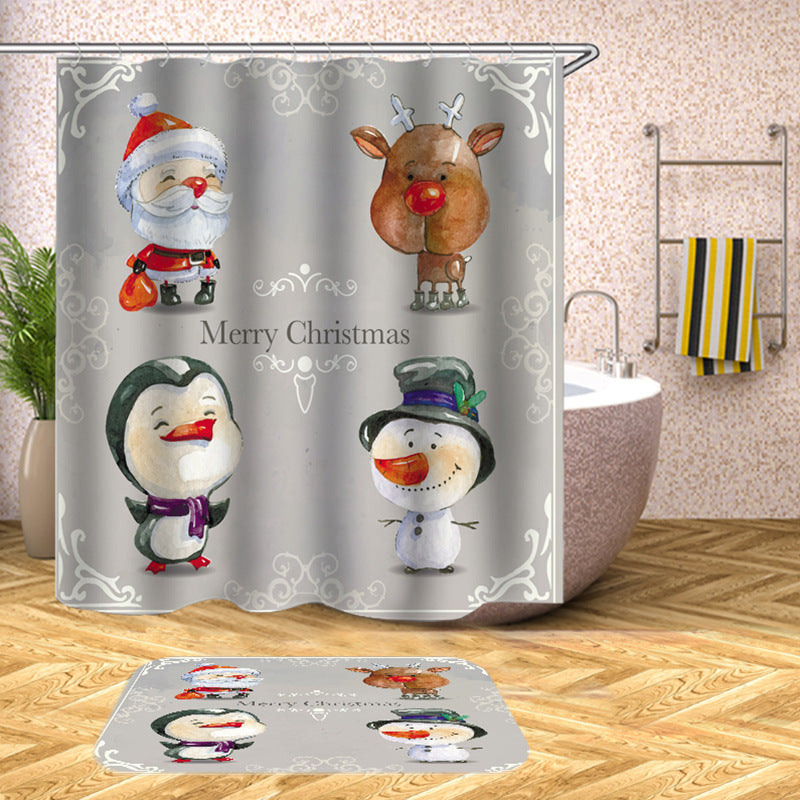 Christmas-themed bathroom decor with a shower curtain and mat featuring cartoon Santa, reindeer, penguin, and snowman. The text "Merry Christmas" is on the gray background.