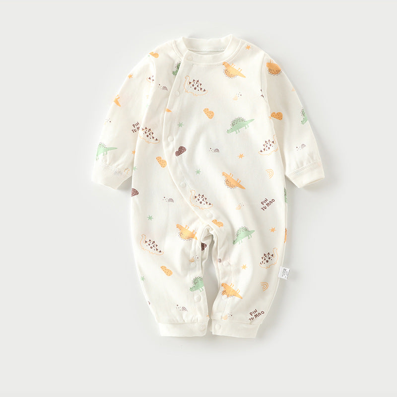 White baby onesie with colorful dinosaur prints in green, orange, and brown, featuring long sleeves and a front snap closure, against a plain background.