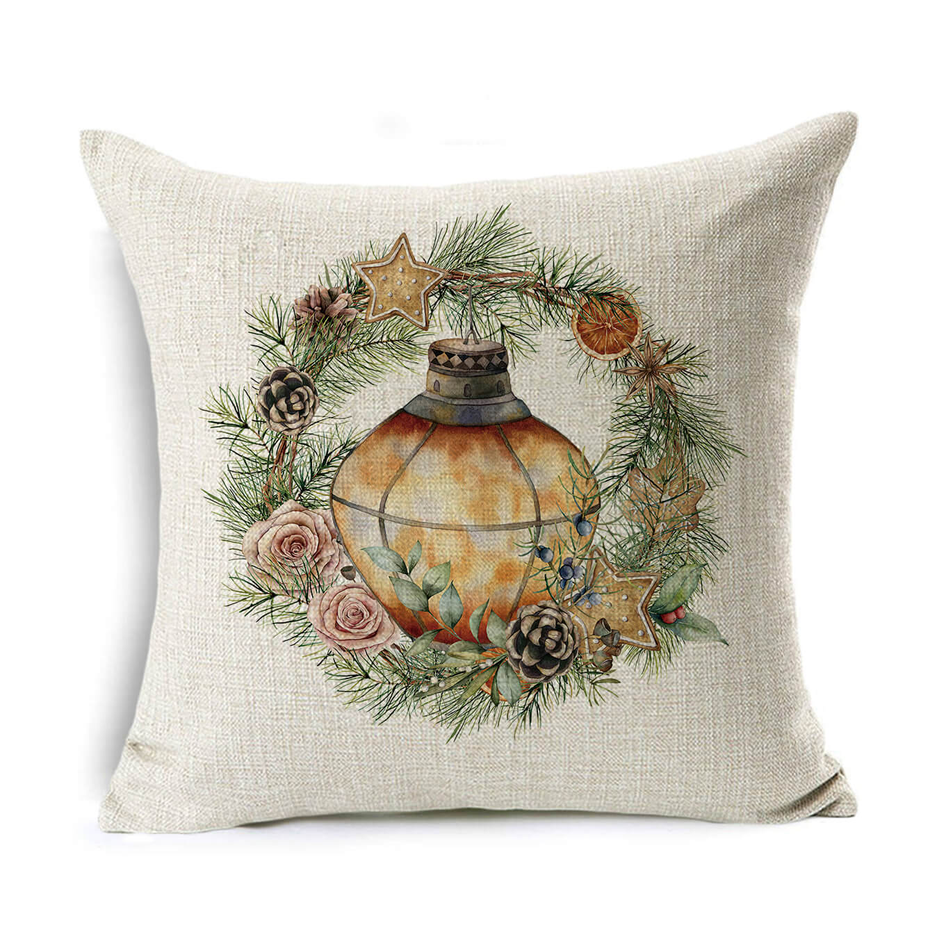A decorative pillow featuring a wreath of pine branches, roses, pinecones, and gold stars surrounding a vintage lantern. The background is a textured beige fabric.