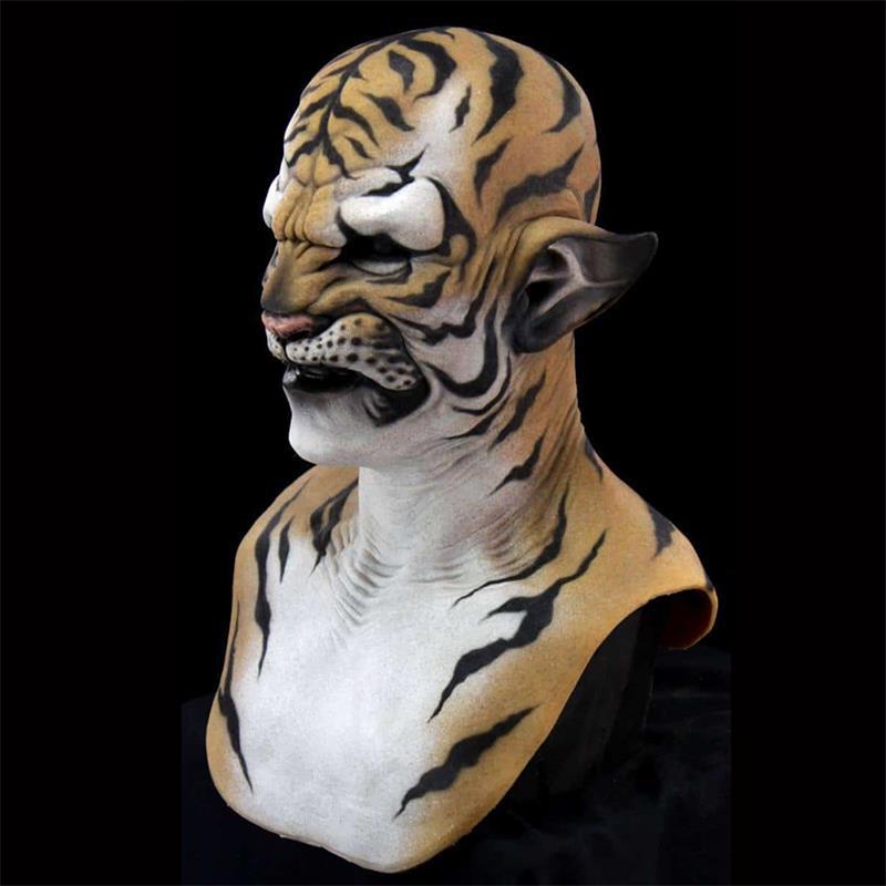 A lifelike tiger mask with realistic stripes, feline features, and detailed textures covers a head, blending human and tiger characteristics against a black background.