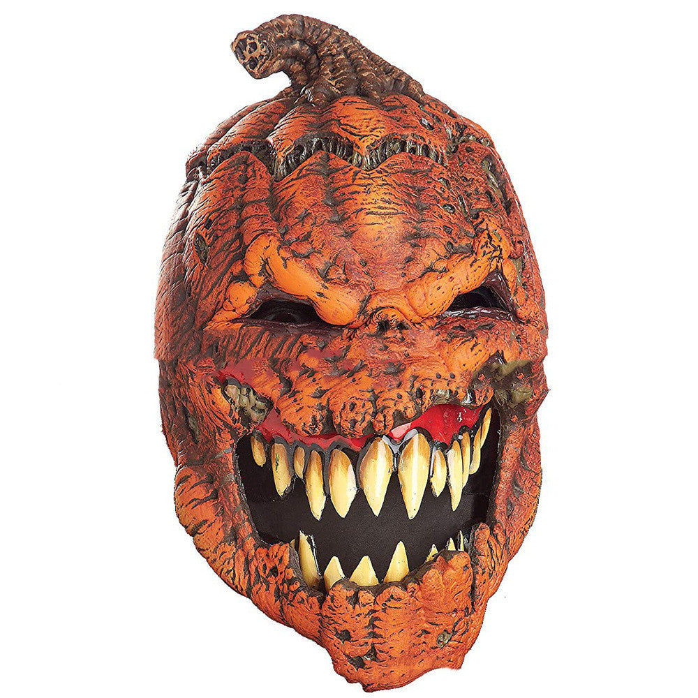 A scary pumpkin mask with an evil grin, long yellow teeth, and a textured orange surface resembling wrinkled skin. A vine is visible on top, adding to its eerie appearance.
