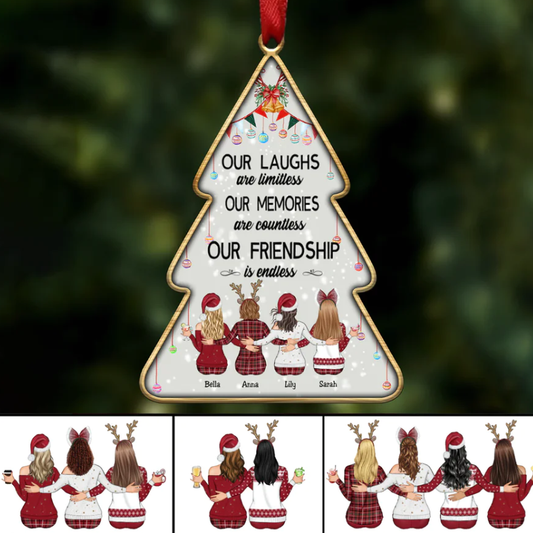 Tree-shaped ornament with four girls in holiday outfits embracing. Text reads: "Our laughs are limitless, our memories are countless, our friendship is endless."