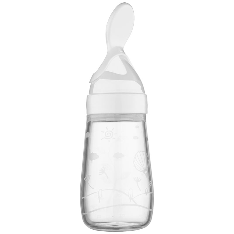 Clear baby bottle with a white spoon lid, featuring a serene design of the sun, clouds, a hot air balloon, and flowers. Ideal for feeding infants.